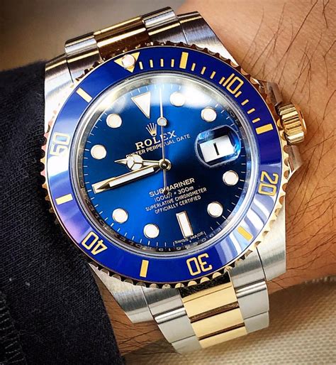 rolex submariner black dial stainless steel bracelet gold trim|Rolex Submariner bluesy price.